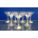 A GROUP OF HOLLOW-STEM CHAMPAGNE GLASSES