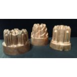 THREE COPPER FOOD MOULDS