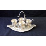 FOUR SILVER EGG CUPS AND STAND, WALKER & HALL