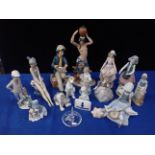 A LALIQUE RING HOLDER AND A QUANTITY OF LLADRO AND NAO FIGURES