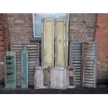 A COLLECTION OF WINDOW SHUTTERS