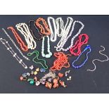 A COLLECTION OF CORAL CHIP NECKLACES
