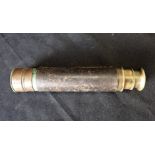 A 19TH CENTURY LACQUERED BRASS AND LEATHER COVERED THREE DRAW POCKET TELESCOPE