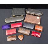 A COLLECTION OF OLD LEATHER JEWELLERY BOXES
