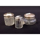THREE SILVER TOPPED CUT GLASS DRESSING TABLE JARS