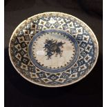 A PERSIAN POTTERY PLATE