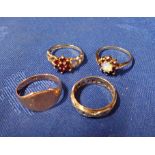 A COLLECTION OF THREE 9CT GOLD DRESS RINGS