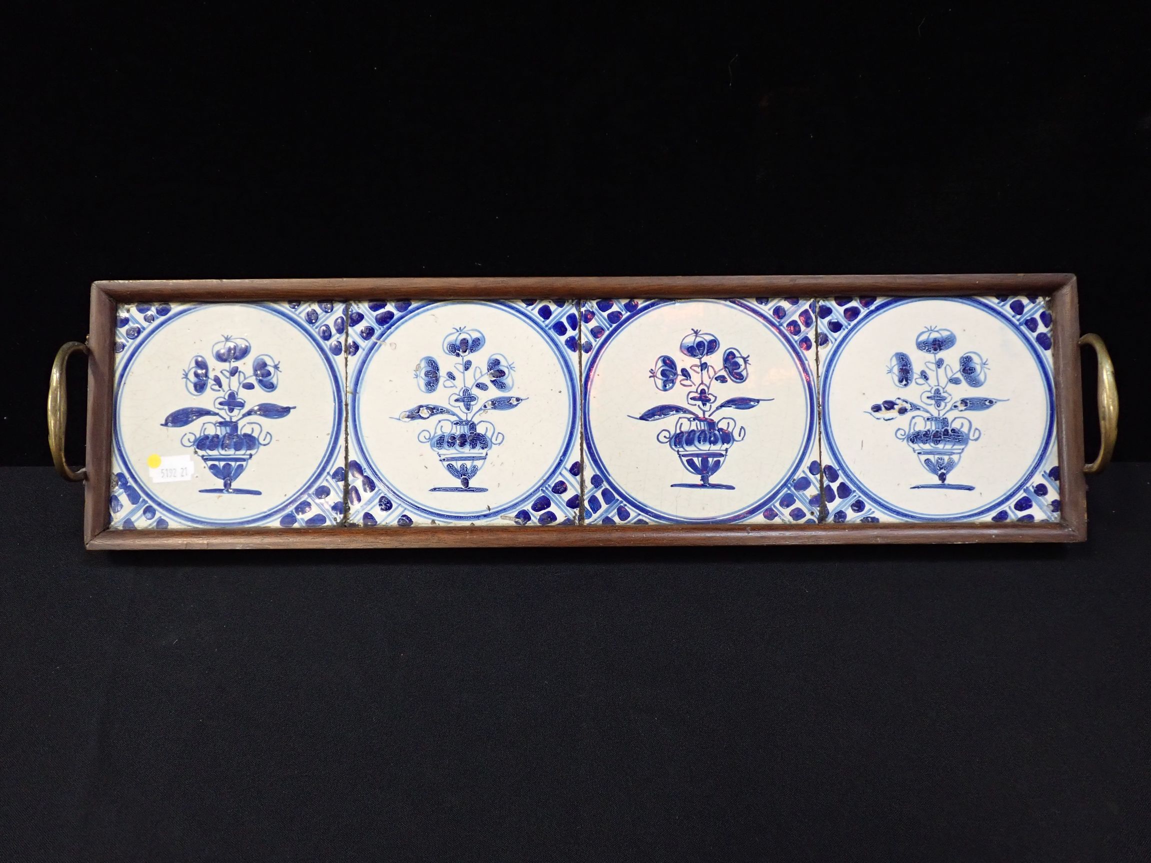 FOUR TIN-GLAZE TILES, FITTED AS A TRAY