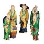 A GROUP OF CHINESE POTTERY 'SINCAI' DECORATED FIGURES