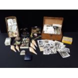 AN OAK BOX, OLD PHOTOS, CARVED SHELLS, CIGARETTE CARDS