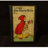 A VINTAGE LITTLE RED RIDING HOOD MONEY TIN