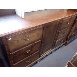 A LARGE OAK SIDEBOARD OR DRESSER