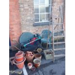 A VINTAGE WOODEN STEP LADDER