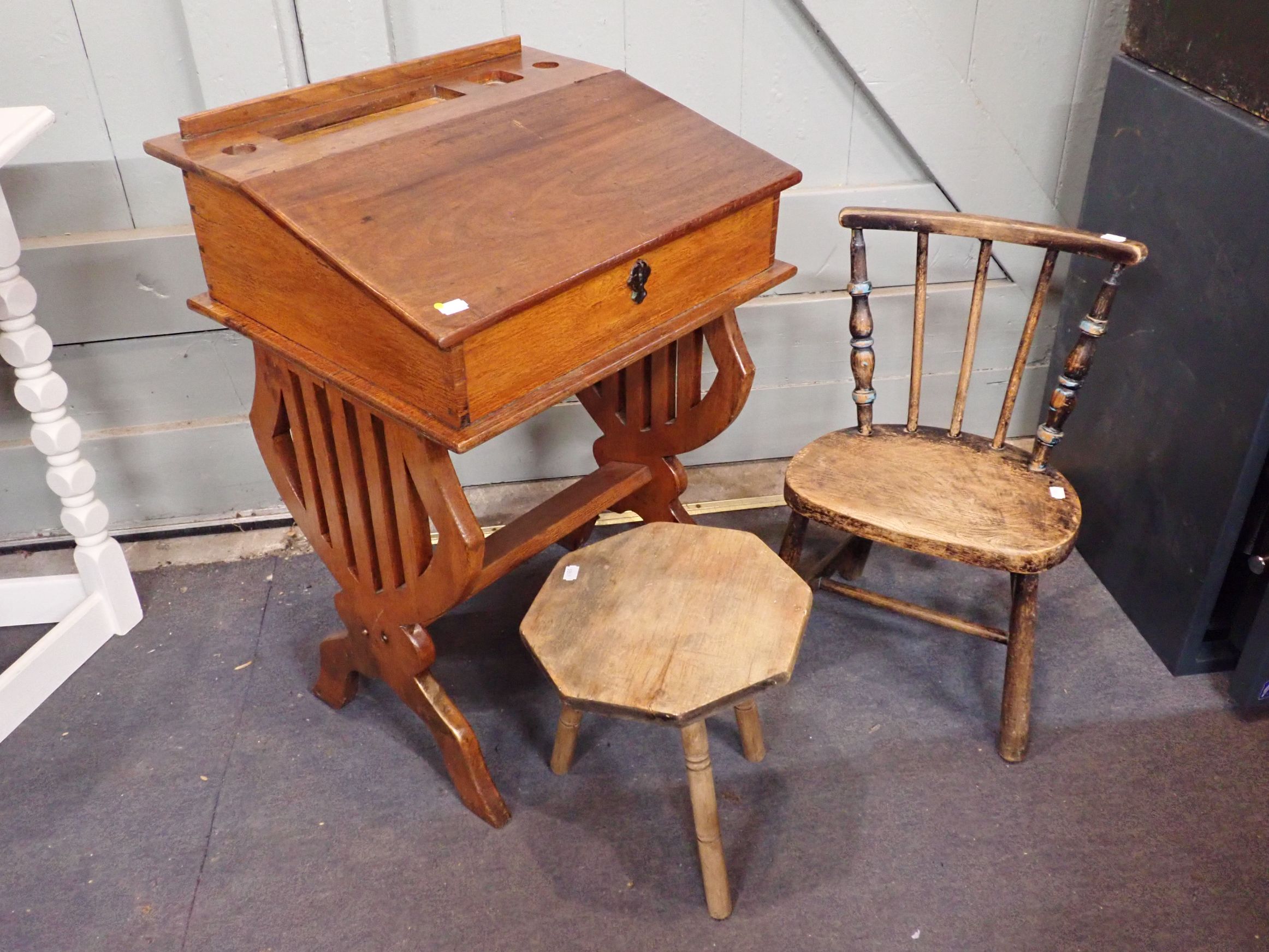 AN EDWARDIAN MAHOGANY CHILD'S DESK