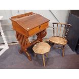 AN EDWARDIAN MAHOGANY CHILD'S DESK