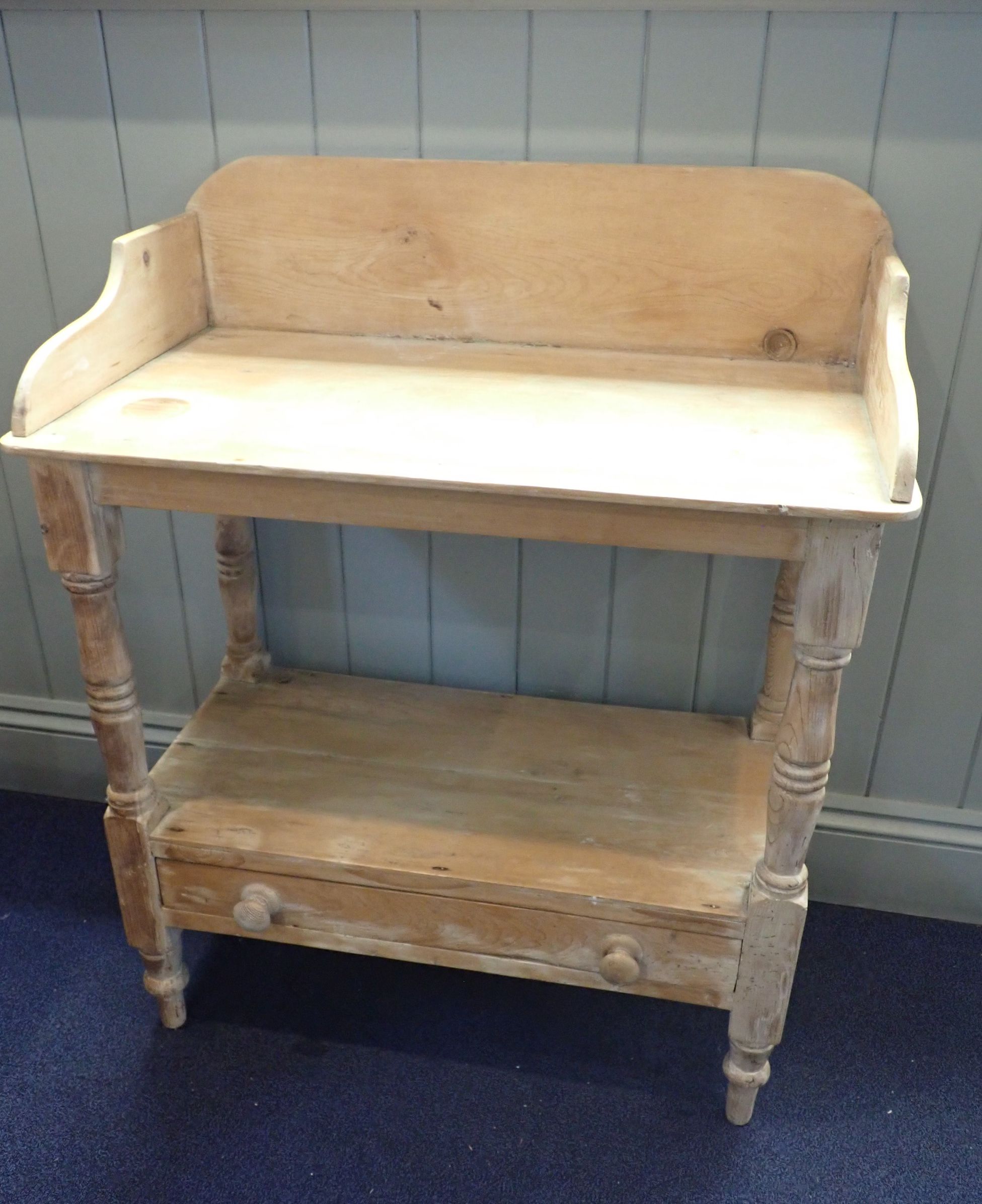 A VICTORIAN STRIPPED PINE WASHSTAND