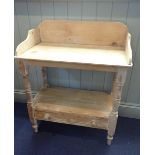 A VICTORIAN STRIPPED PINE WASHSTAND