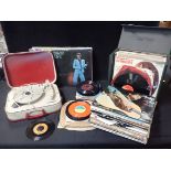 A FIDELITY PORTABLE RECORD PLAYER AND TWO CASES OF VINYL RECORDS