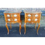 A PAIR OF FRENCH WALNUT , ORMOLU AND PORCELAIN MOUNTED BEDSIDE TABLES