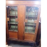 AN EDWARDIAN MAHOGANY DISPLAY CABINET