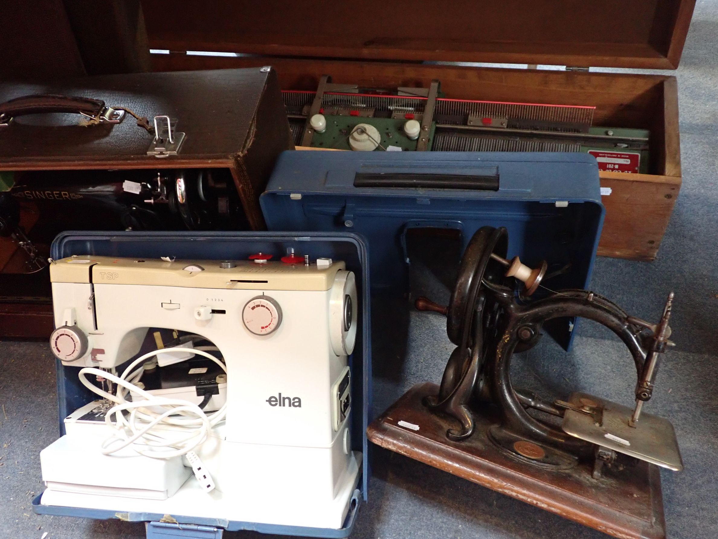 AN ELNA TSP SEWING MACHINE, IN METAL CASE