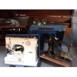 AN ELNA TSP SEWING MACHINE, IN METAL CASE