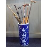 A CHINESE PRUNUS CYLINDER STICK STAND