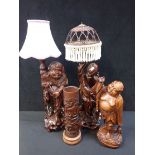 A PAIR OF FAR EASTERN CARVED WOOD FIGURE LAMPS