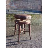 A REGENCY MAHOGANY PIANO STOOL