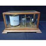 AN OAK CASED BAROGRAPH, BY SHORT & MASON LTD