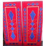 A SUBSTANTIAL PAIR OF DOORS, COVERED WITH BLUE AND RED VELVET
