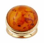 A LARGE AMBER DRESS RING