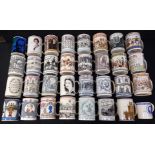 A COLLECTION OF WEDGWOOD COMMEMORATIVE MUGS