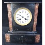 A VICTORIAN BLACK SLATE AND RED VARIEGATED MARBLE MANTEL CLOCK
