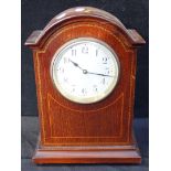 AN EDWARDIAN MAHOGANY MANTEL CLOCK