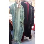 A COLLECTION OF VELVET VINTAGE CLOTHING