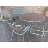 A FRENCH STYLE METAL CIRCULAR GARDEN TABLE AND FOUR ARMCHAIRS