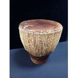 A TRIBAL ANIMAL SKIN DRUM