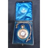 A HALF HUNTER GOLD PLATED POCKET WATCH AND CHAIN