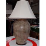 AN IMPRESSIVE POTTERY TABLE LAMP