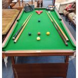 AN 'AMBASSADOR' SNOOKER TABLE, ON FOLDING LEGS