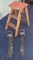 A PAIR OF VINTAGE FOLDING STEPS
