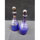 A PAIR OF BRISTOL BLUE GLASS DECANTERS
