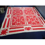 A RED AND WHITE PATCHWORK QUILT, POSSIBLY AMERICAN