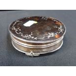 A TORTOISESHELL AND SILVER ROUND DRESSING TABLE BOX
