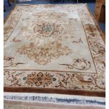 A LARGE CHINESE RUG, CREAM GROUND