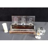 AN EARLY 20TH CENTURY DESK INKWELL