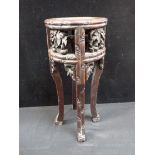 A FAR EASTERN CARVED HARDWOOD STAND