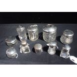 TEN PLAIN SILVER-TOPPED DRESSING JARS