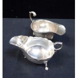 A SILVER SAUCE BOAT, 1905 WITH SCROLL HANDLE AND HOOF FEET